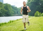 Healthy Young Man Running In The Park Stock Photo, Picture and Royalty Free  Image. Image 17501813.